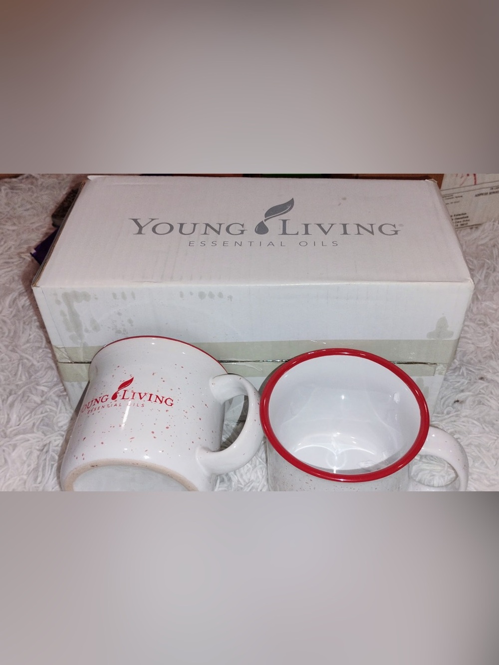 Young Living White Ceramic Mugs with Red Rim and Speckle Accents